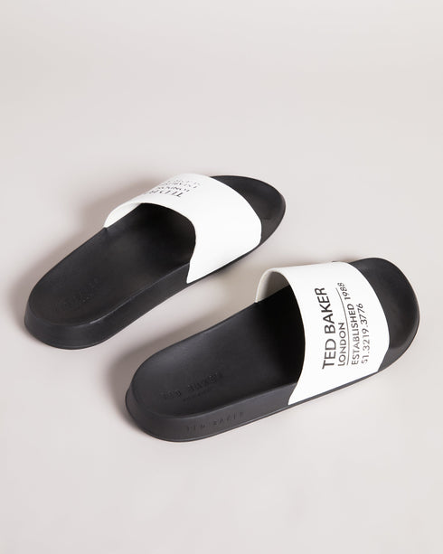 AZIELL-Sandals-Always be ready to hit the pool with AZIELL in your collection. In a classic slider style with Ted Baker branding across the top panel, these are a simple but stylish way to finish off your summer outfits. Sliders Ted Baker branded panel Open toe Slip on PU- Ted Baker Romania
